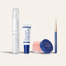 Load image into Gallery viewer, Ultimate Lip Care Collection NZL lineup with Lip Line Corrector in a tall clear pump, a white blue lip balm tube, a pink lip mask jar, and a blue handle applicator brush