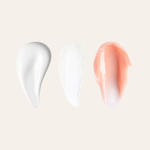 Load image into Gallery viewer, Three lip care swatches on a beige background white cream white balm and peach tinted cream