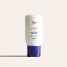 Load image into Gallery viewer, White Reactivating Hand Cream bottle with purple cap on a pale background
