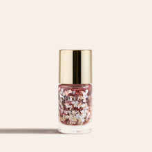 Load image into Gallery viewer, Shimmering pink glitter nail polish in a clear bottle with a gold cap
